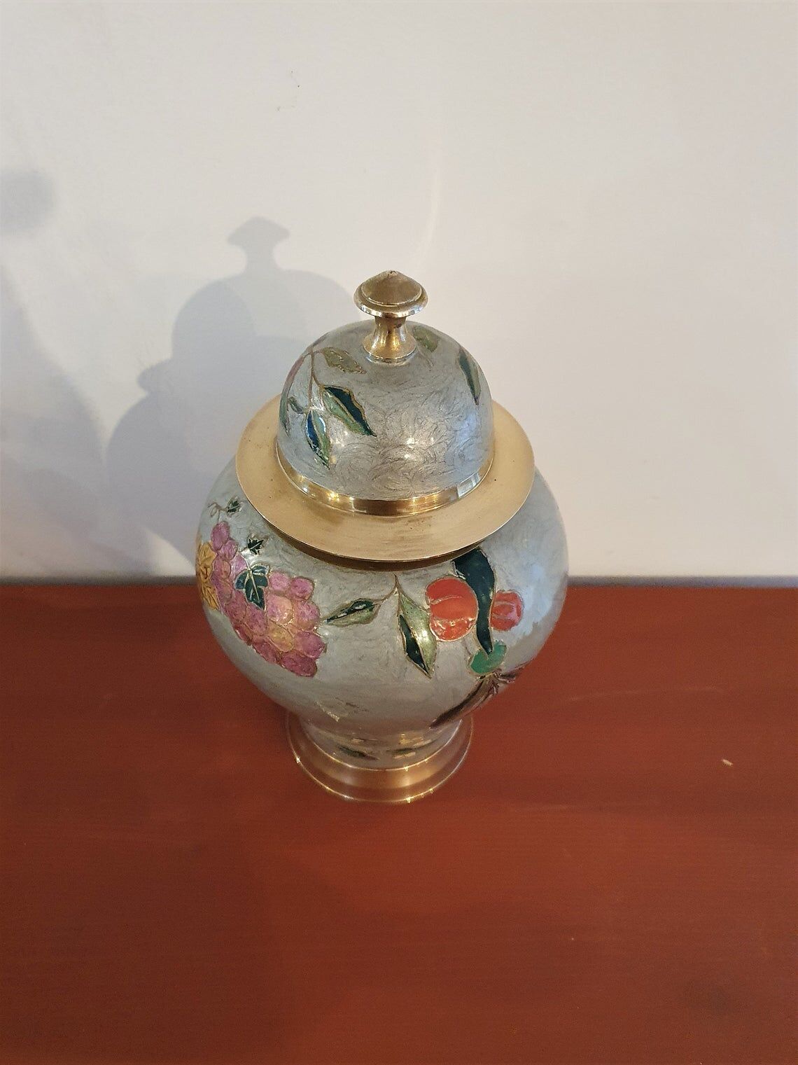 Golden brass urn
