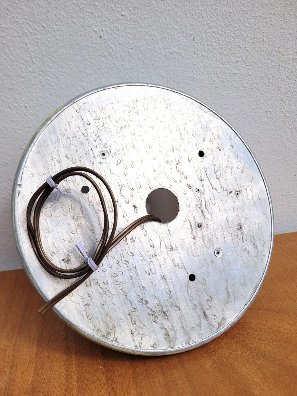 Vintage 1950s wall lamp porthole in aluminium and opal glass.
