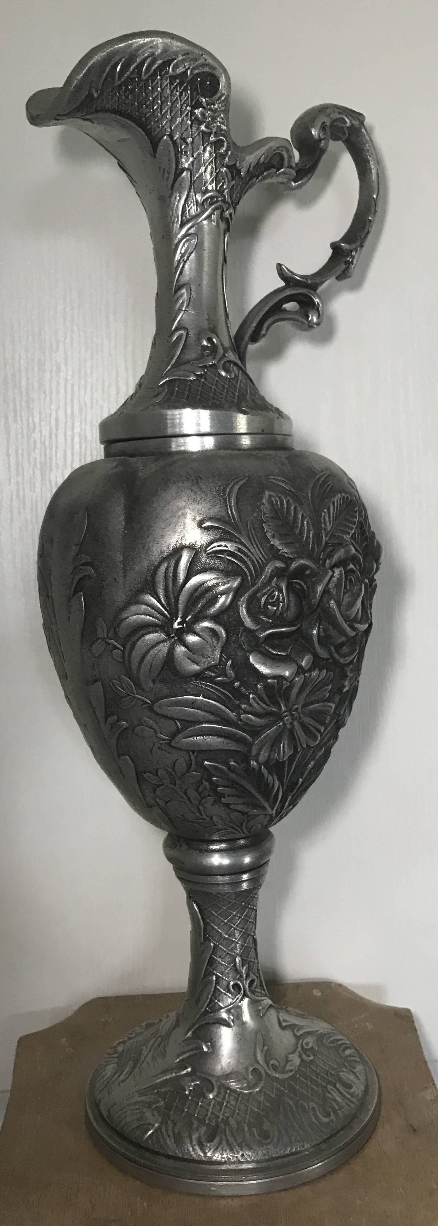 Ewer, Mauro Manetti art foundry, floral embossed decoration and bird's head handle