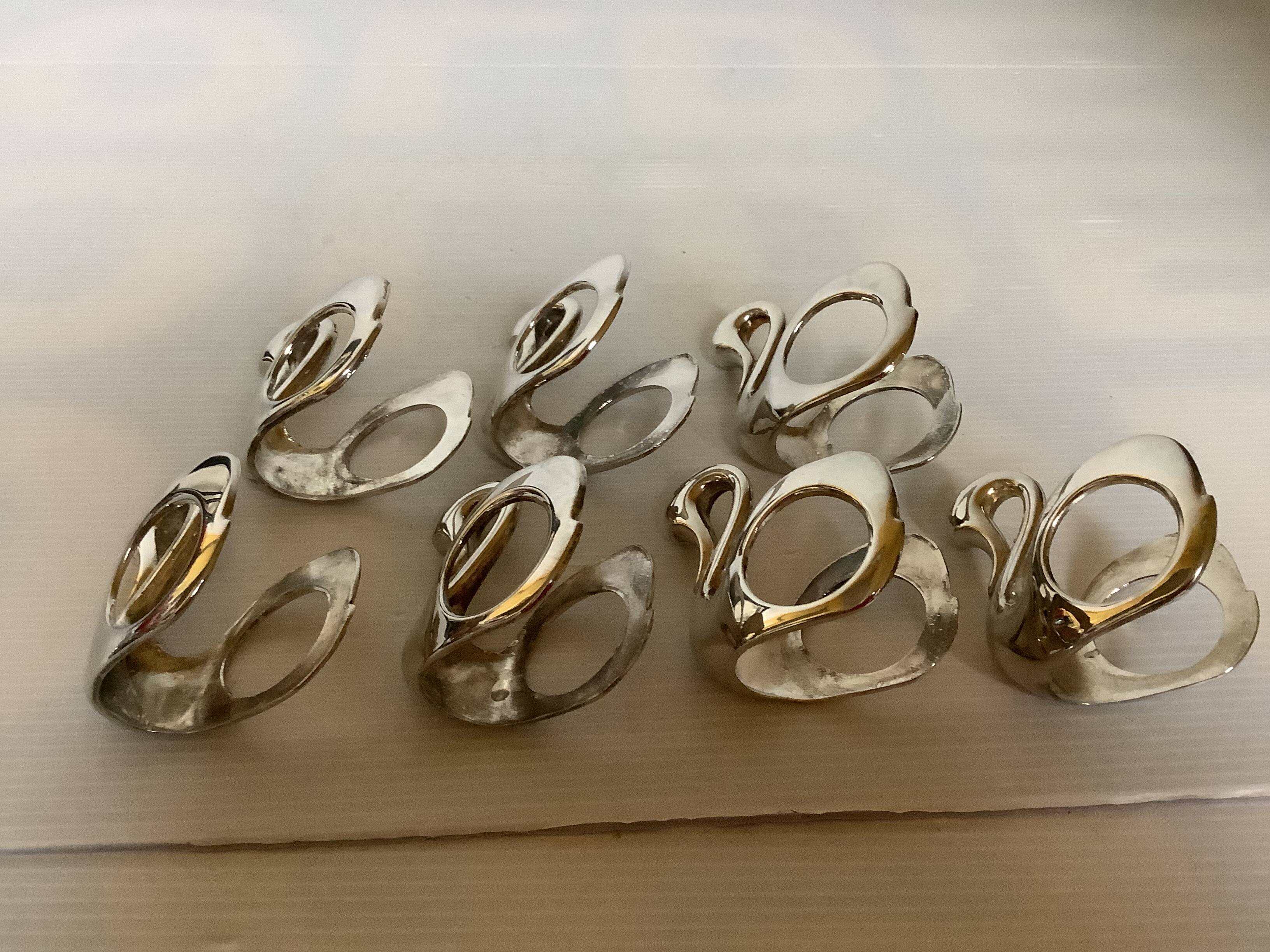 Seven silver-plated zoomorphic metal knife rests