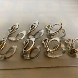 Seven silver-plated zoomorphic metal knife rests