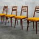 Suite of 4 Czech chairs wood and fabric Yellow "Univerzal" late 60