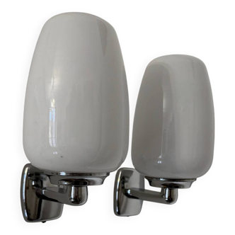 Chrome and opaline wall lights from the 70s.