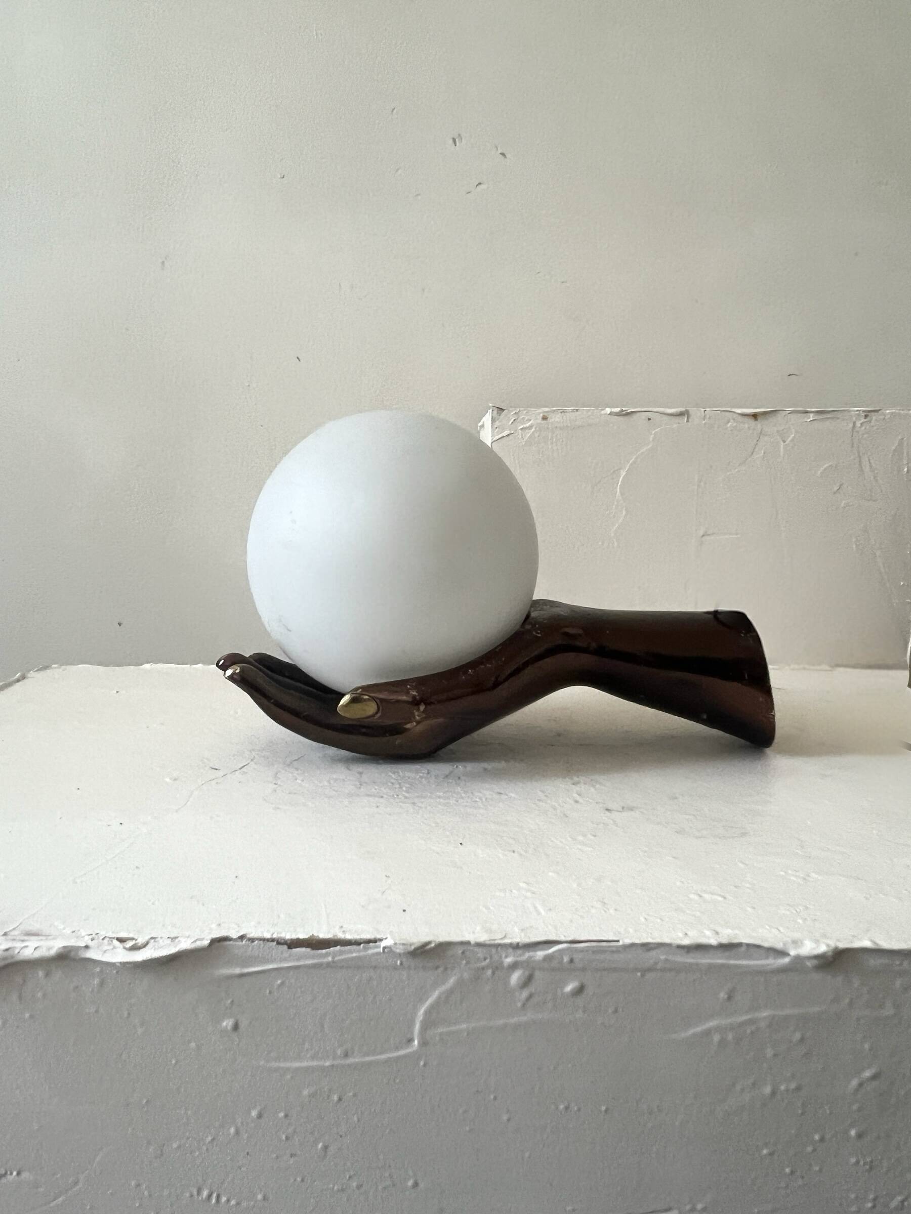 Vintage table lamp hand-crafted in bronze with an opaline globe, Maison Arlus 1970.