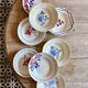 Set of 8 mismatched vintage soup plates