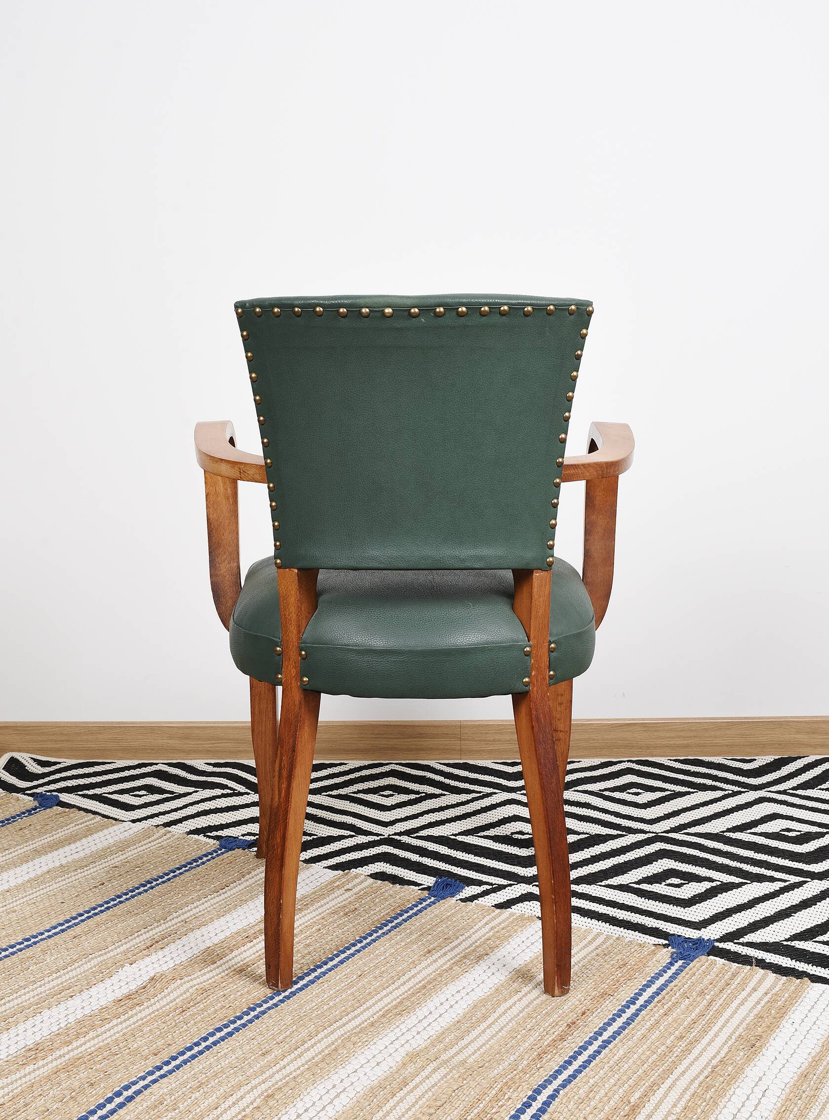 Bridge armchair in green moleskin