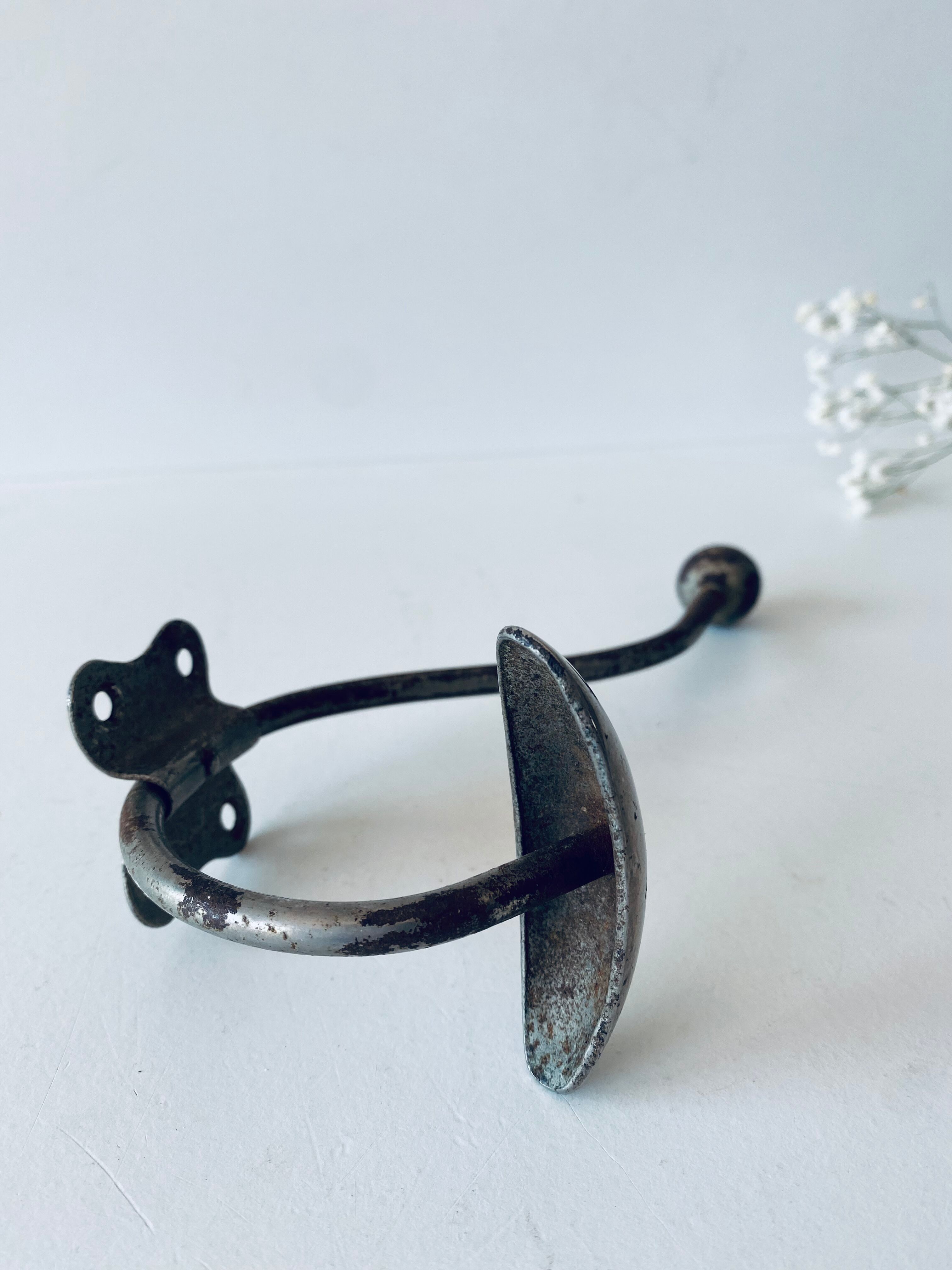 Ancient metal patère