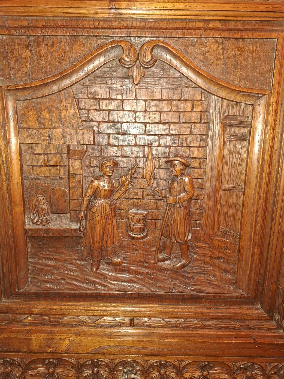 Antique carved oak wardrobe – figurative scene – late 19th century