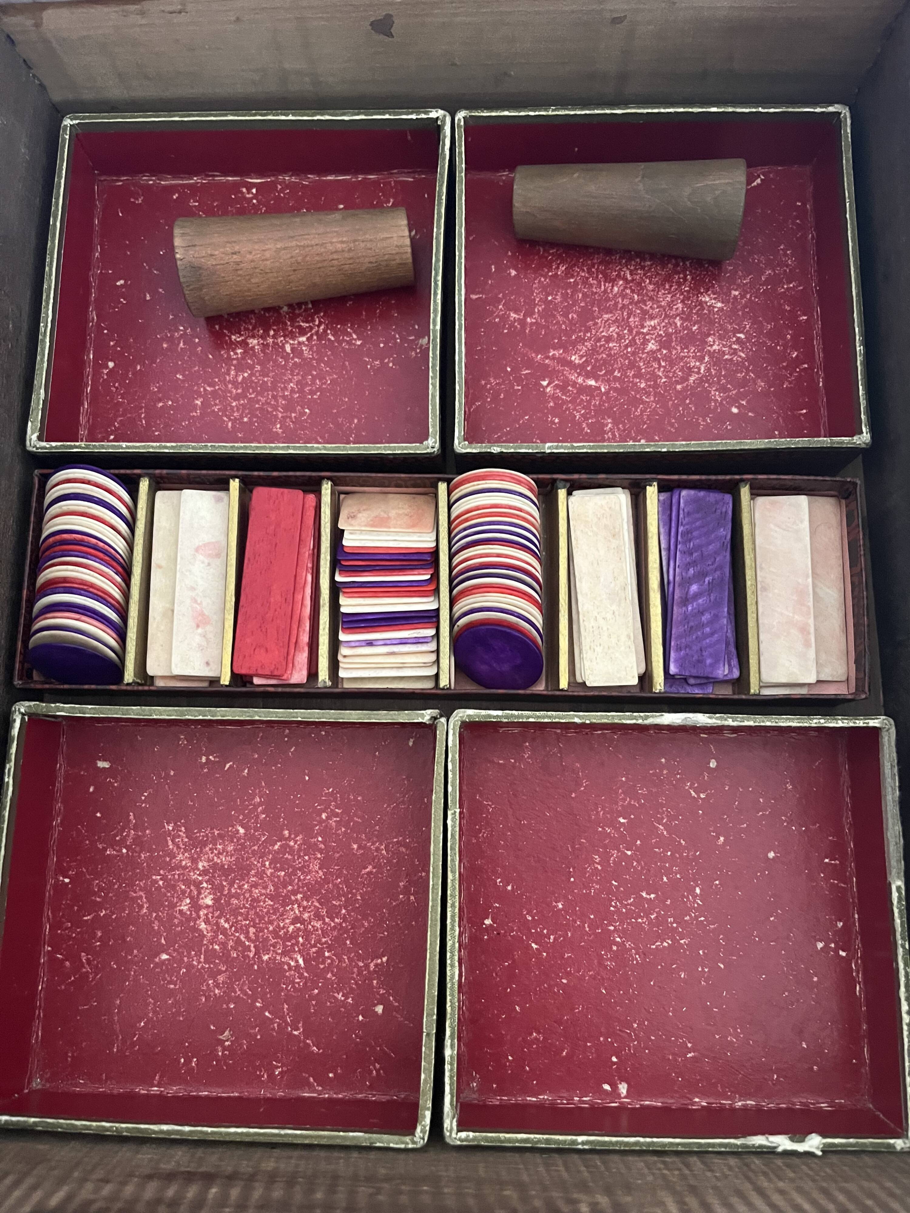 Old game of nain jaune with its bone tokens.