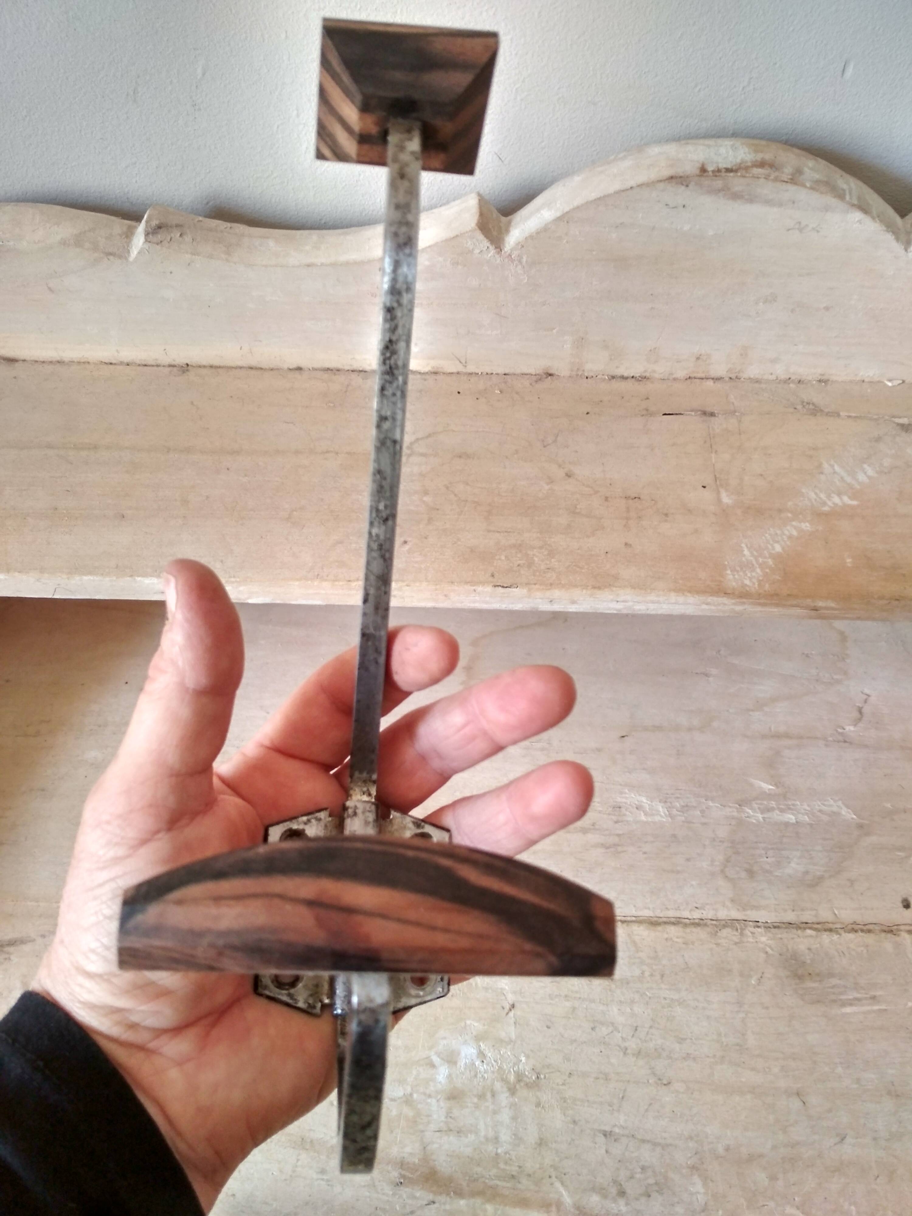 Old coat rack in metal and wood