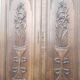 pair of antique solid oak cabinet doors with bird decor
