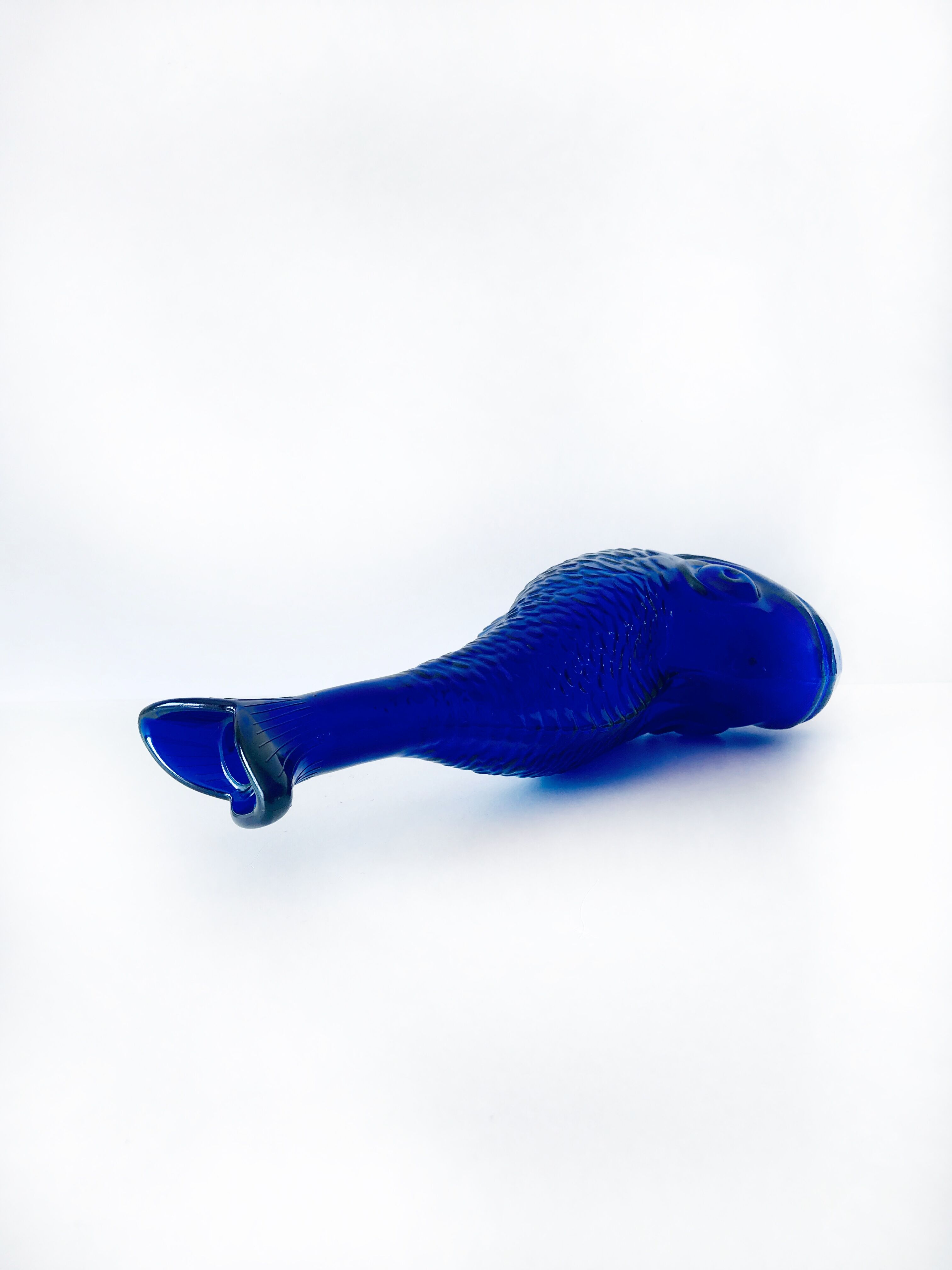 Blue glass fish vase