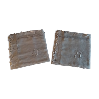 Pair of antique hand-embroidered linen pillowcases