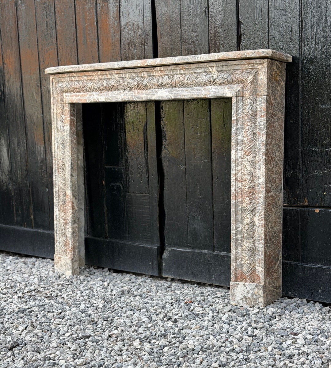 Louis XVI style fireplace in grey Ardennes marble, circa 1900.