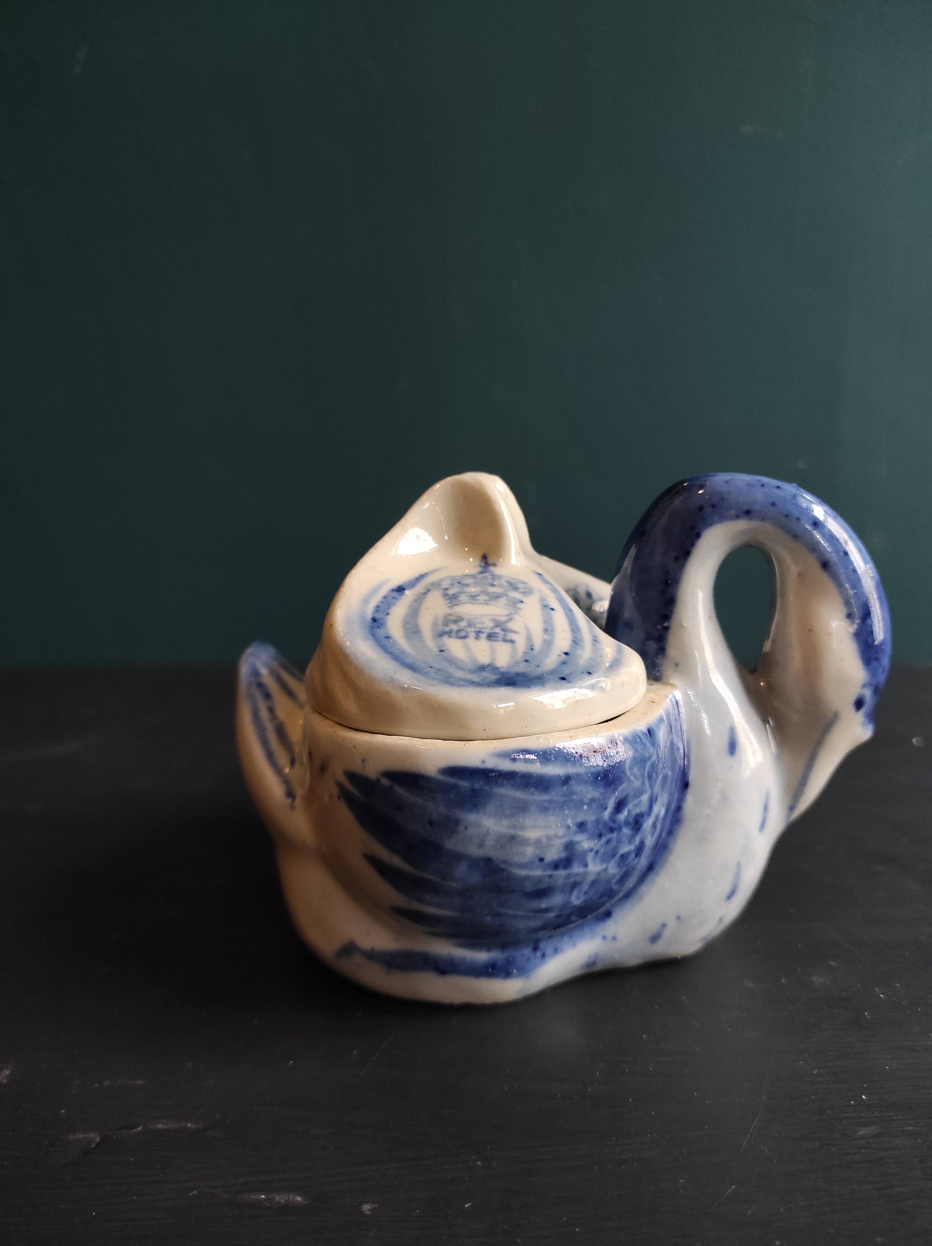 Vintage Vietnamese swan-shaped salt and pepper holder