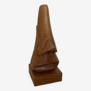 Carved wooden nose-shaped display
