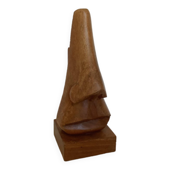 Carved wooden nose-shaped display