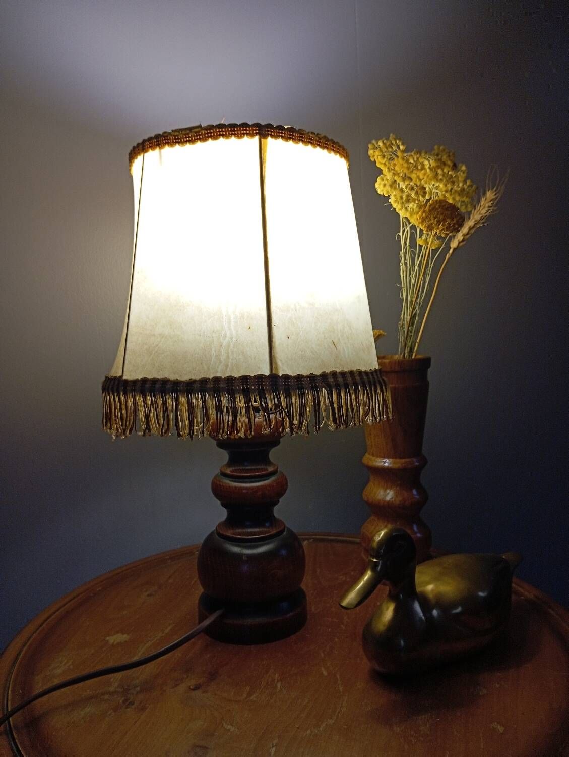 Rustic turned wood table lamp with vintage leather shade