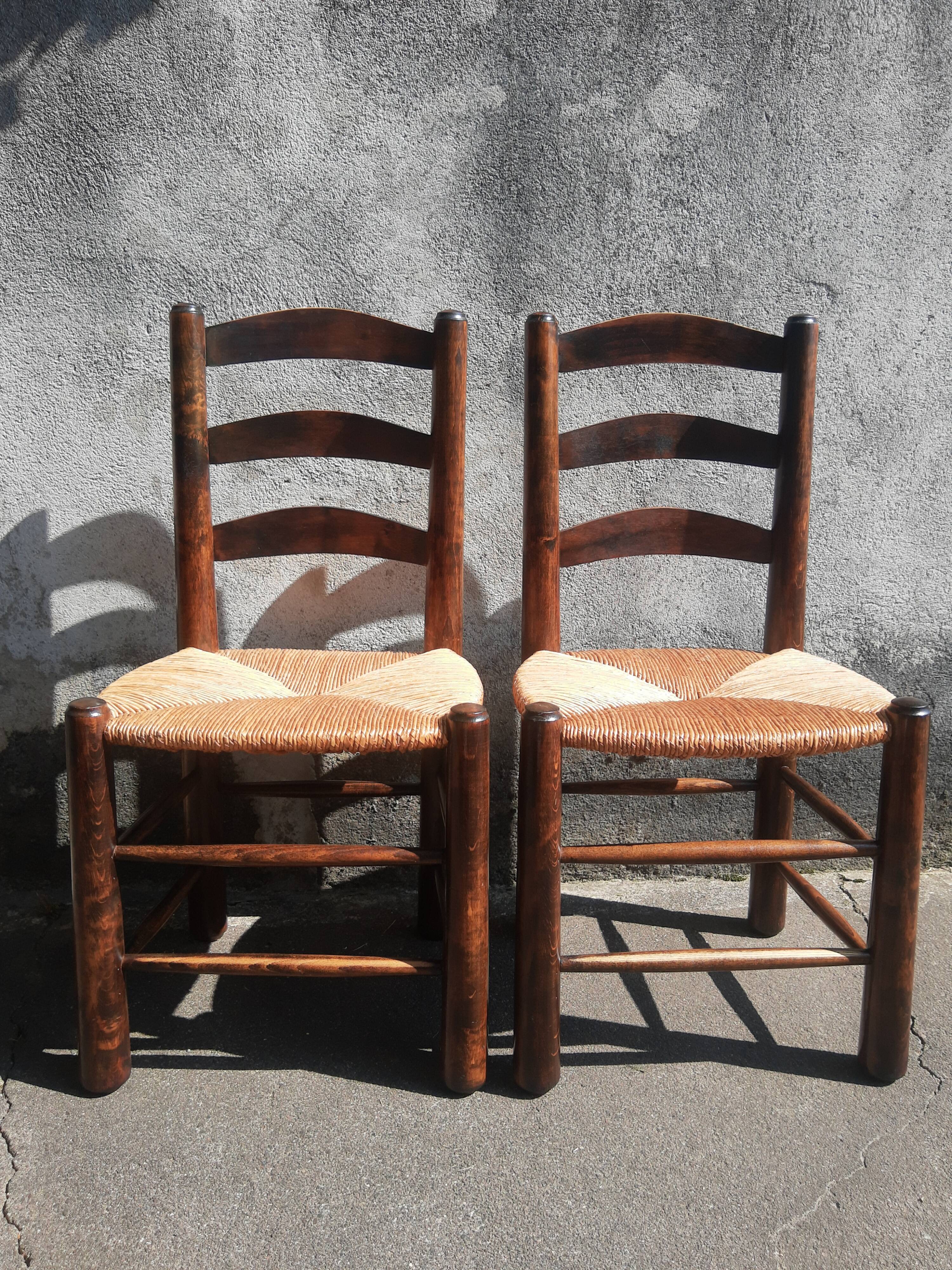 Pair of mulched brutalist chairs and wood