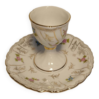 Royal porcelain egg cup with flowers and gilding