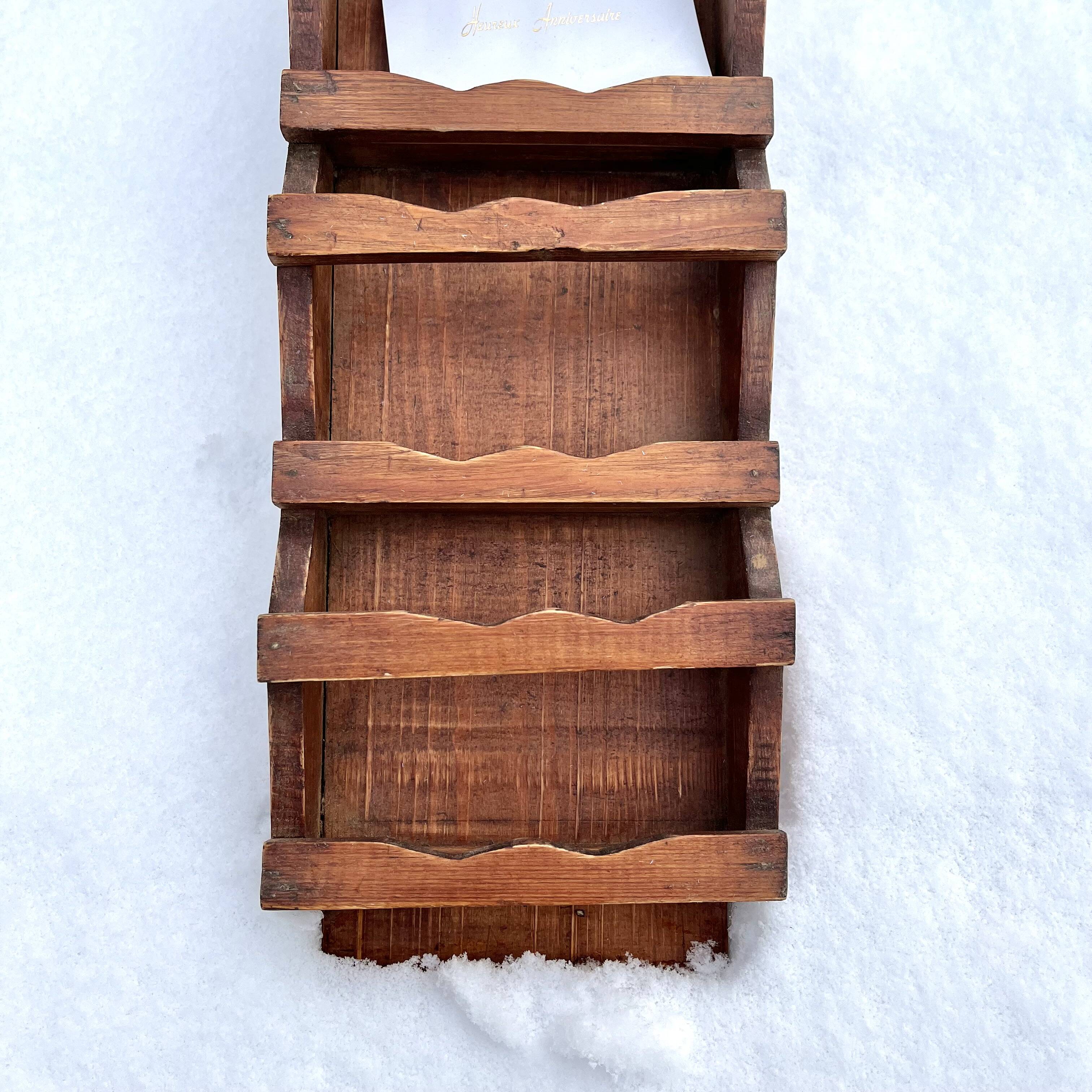 Old wall shelf for postcards or mail