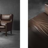 Brown leather wingback chair in mid-century modern Danish style, 1960s.