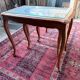 Vintage nesting tables in wood and cane – perfect condition.