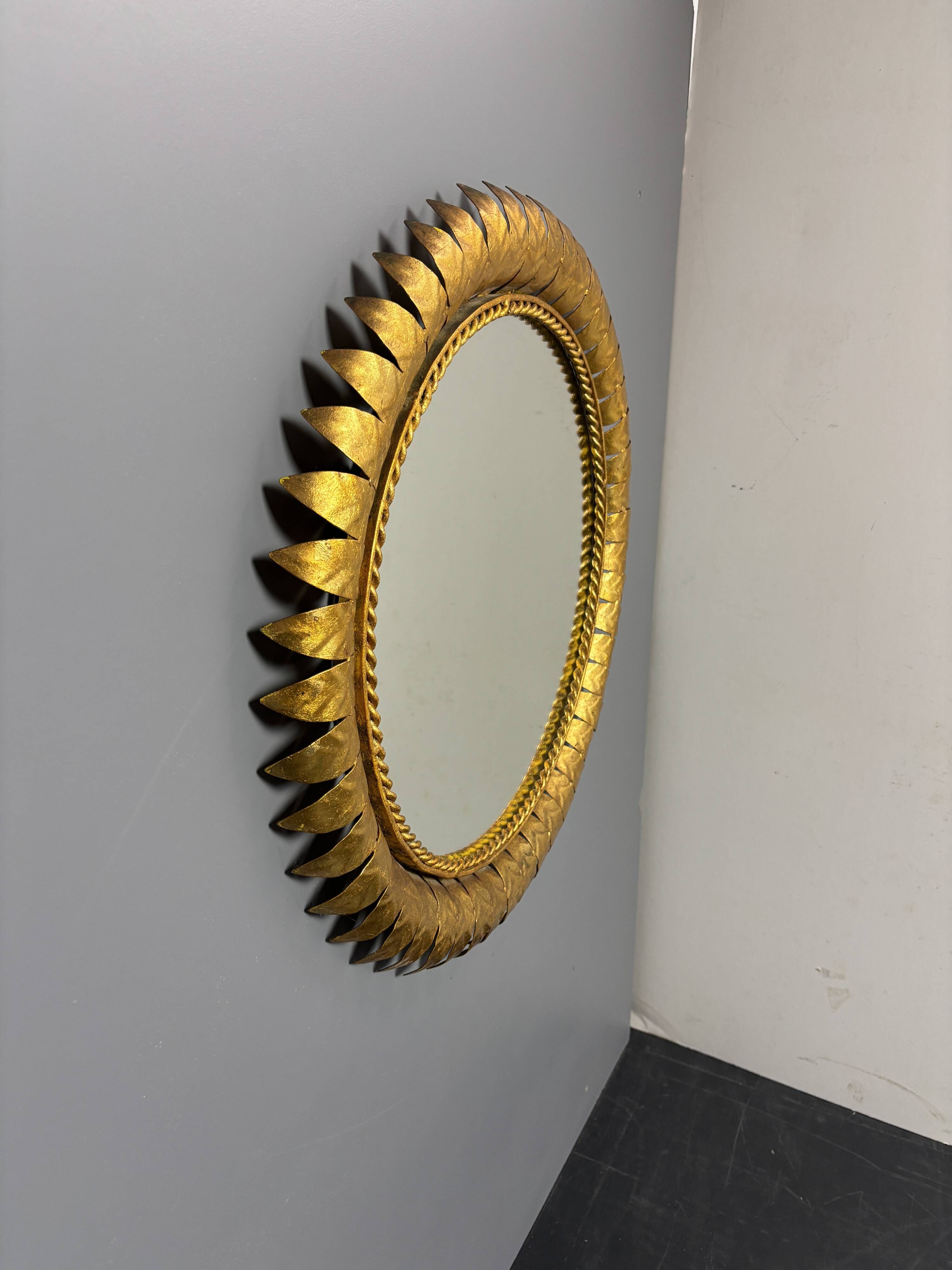 Midcentury bohemian Hollywood Regency Spanish gilt metal sun mirror, 1960s