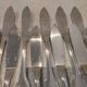 11 silver-plated fish forks and 11 fish knives by Christofle Vendome
