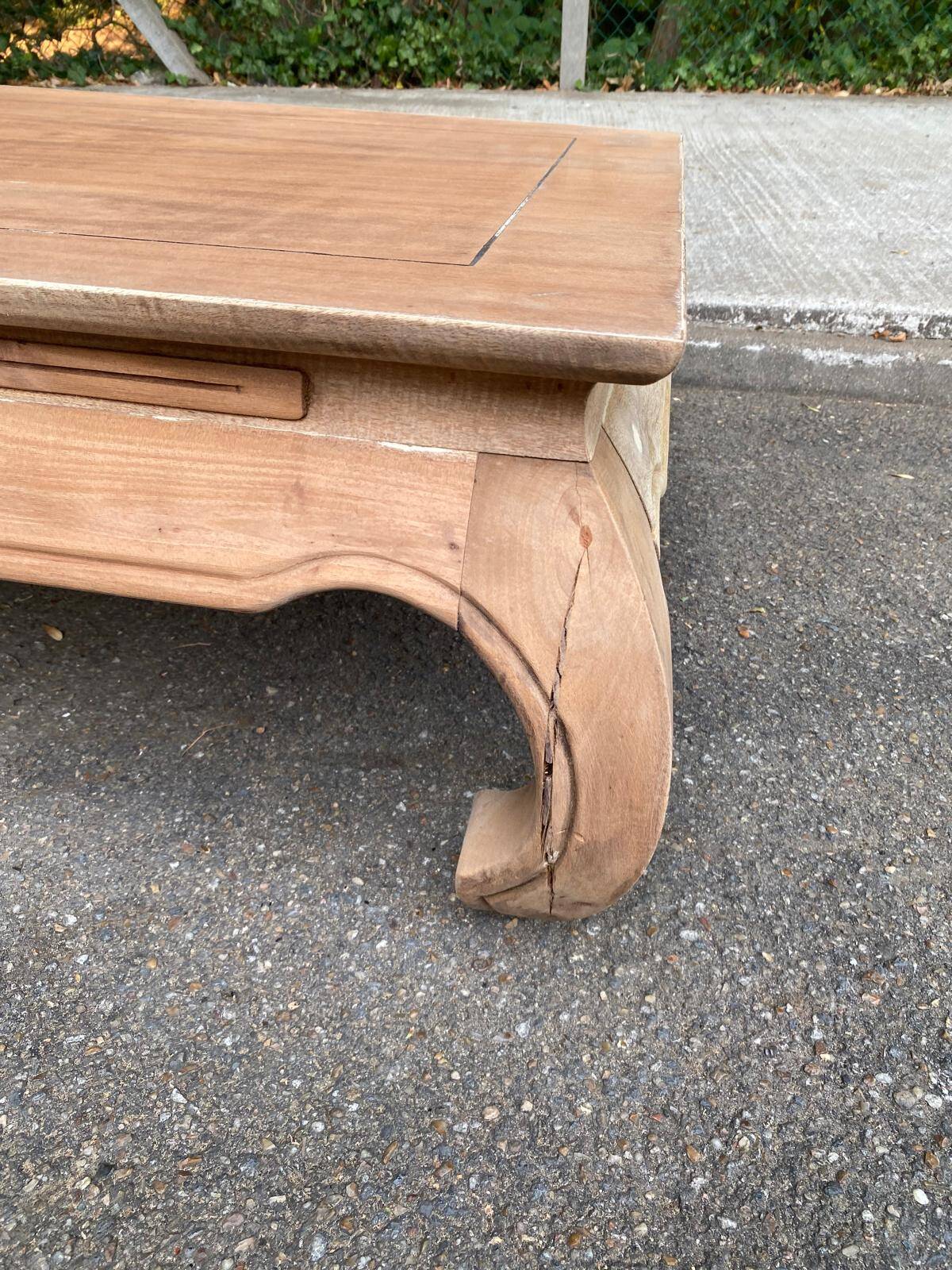 Decapitated opium coffee table in raw wood from the 90s.