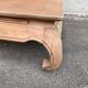 Decapitated opium coffee table in raw wood from the 90s.