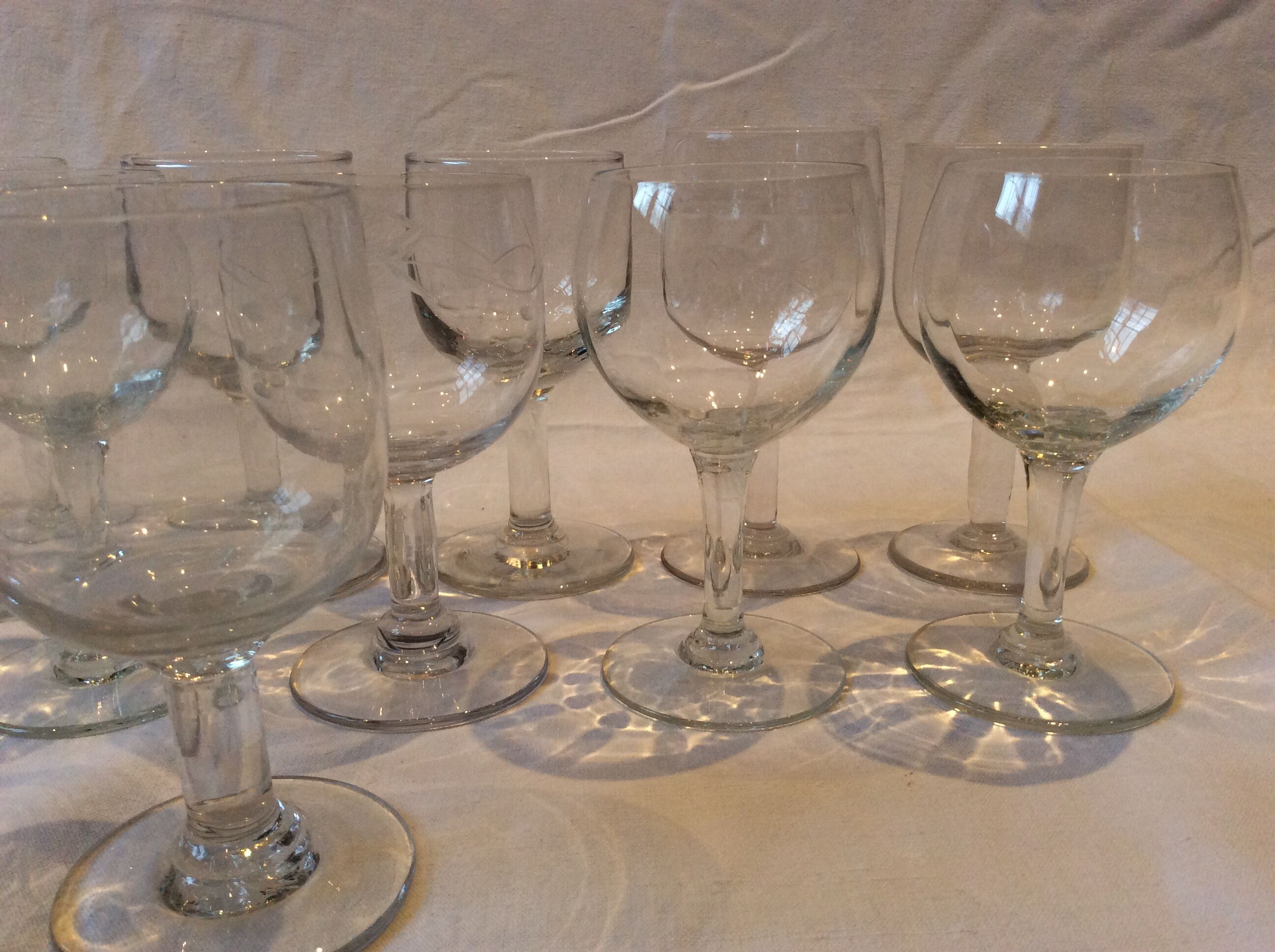 15 mismatched old glasses