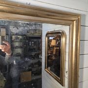 Golden mirror in oak from the 19th century.