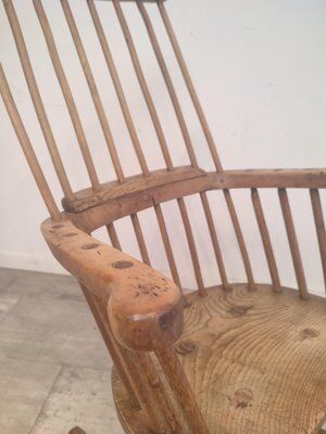 Rocking brutalist chair in oak, France, 1920s