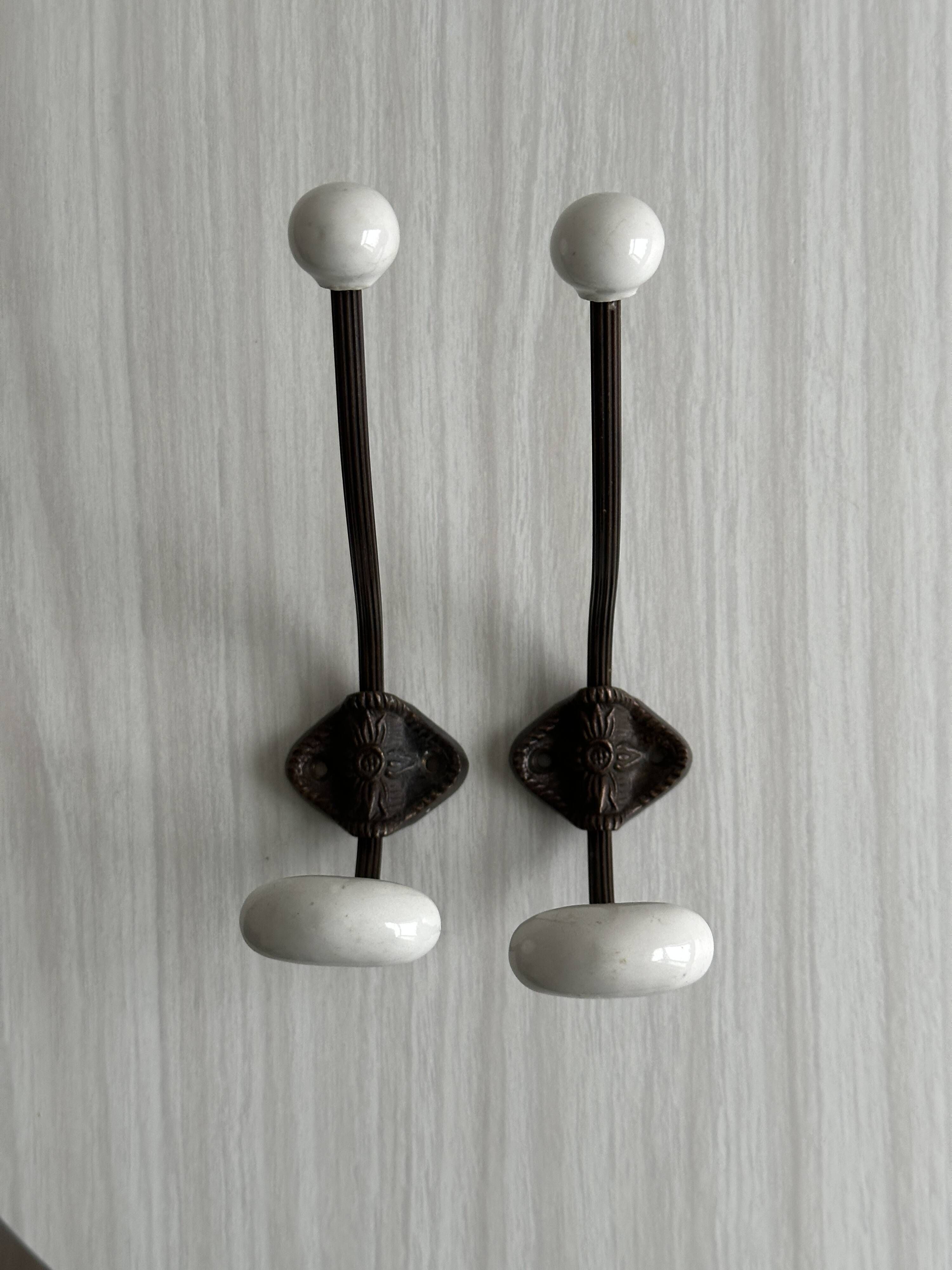 set of 2 metal and porcelain ceramic hooks