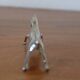 Set of 12 vintage knife rests, in silver metal