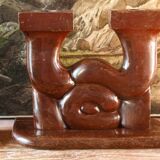 Pair of Art Deco carved wood candlesticks, signed Delaporte