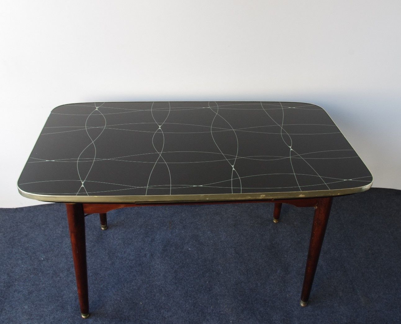 Folding table with black and gold painted glass, 1950