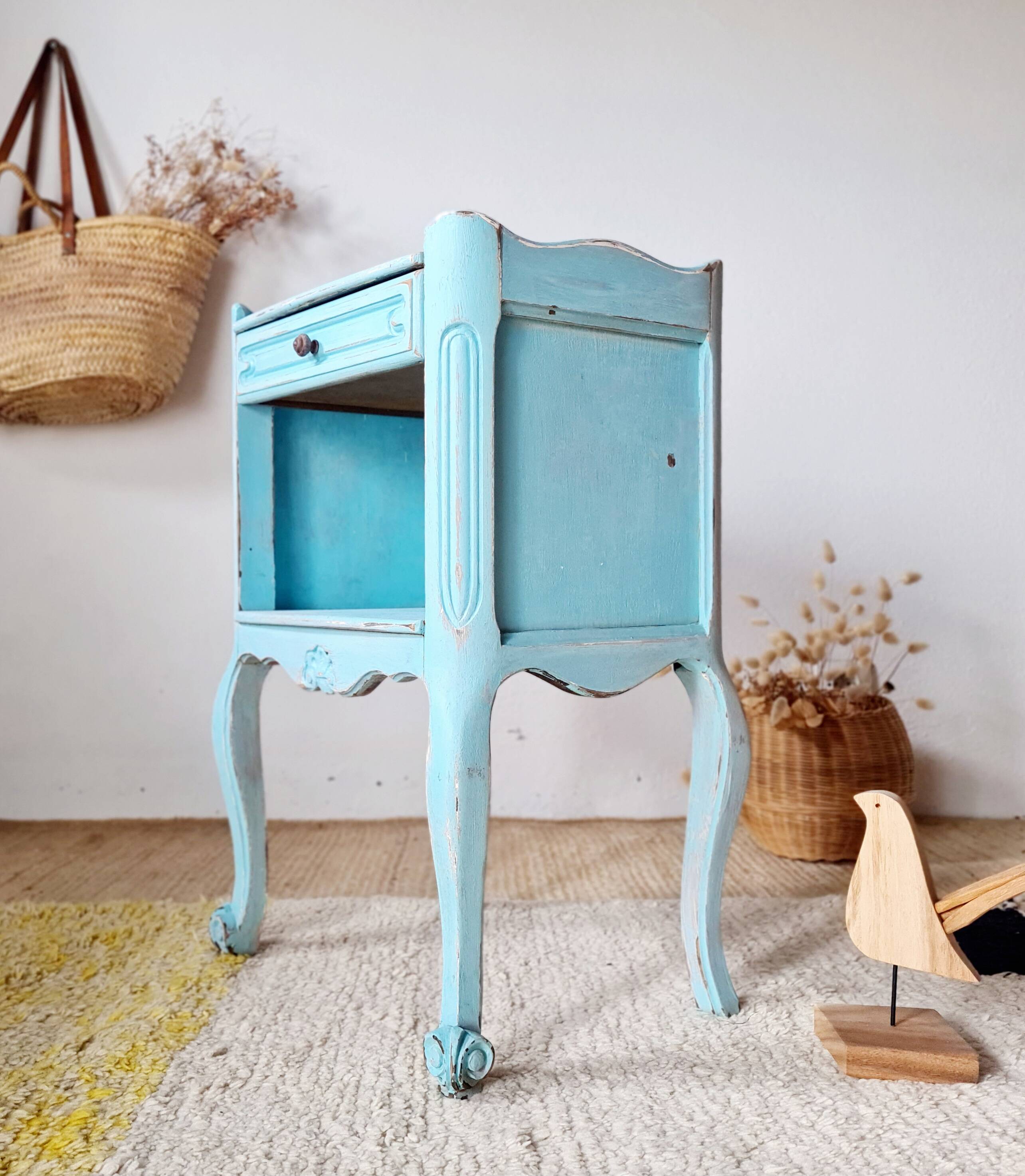 Small vintage bedside table in azure blue patina.