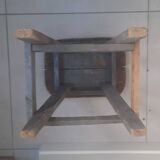 Antique wooden stool in the brutalist style
