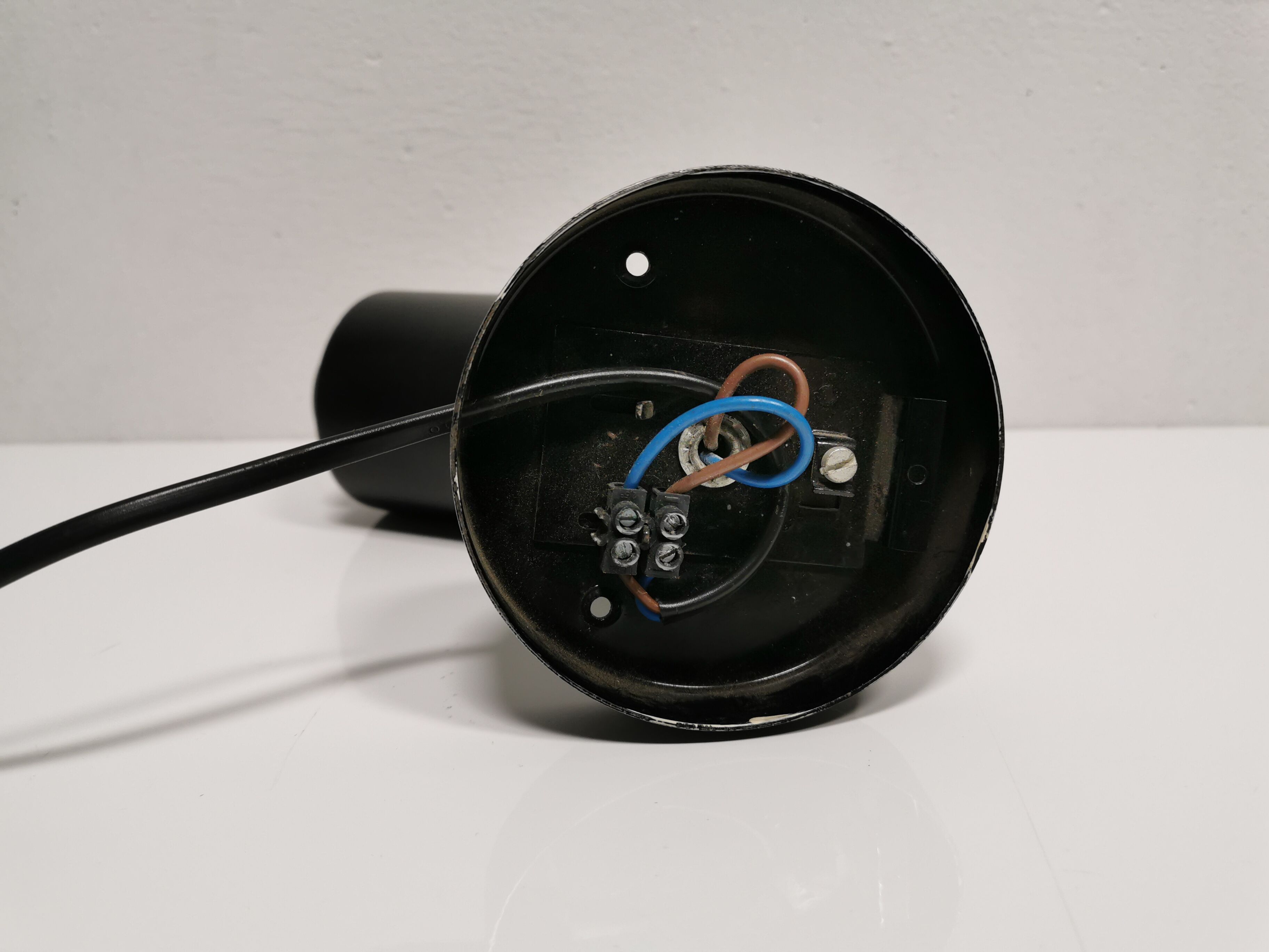 Jacques Biny's black zodiac sconce for Lita