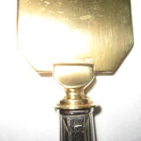 silver metal knife and cake shovel