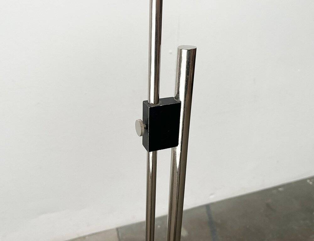 Mid-century German minimalist tripod floor lamp from the 1960s.