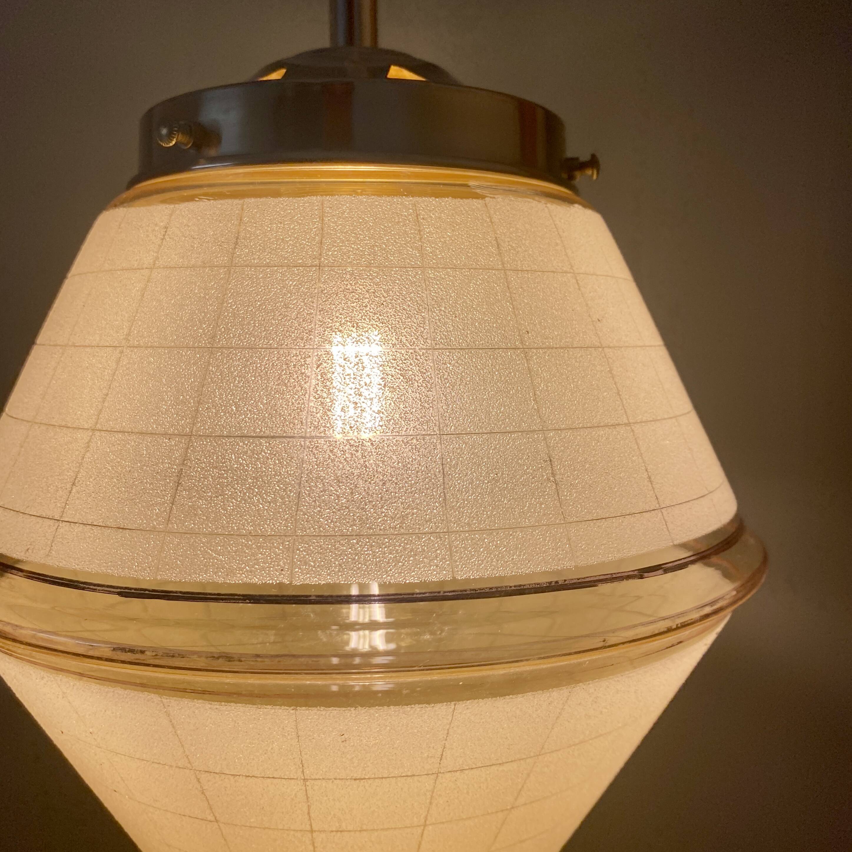 Vintage art deco globe pendant light in yellow and gold granite glass