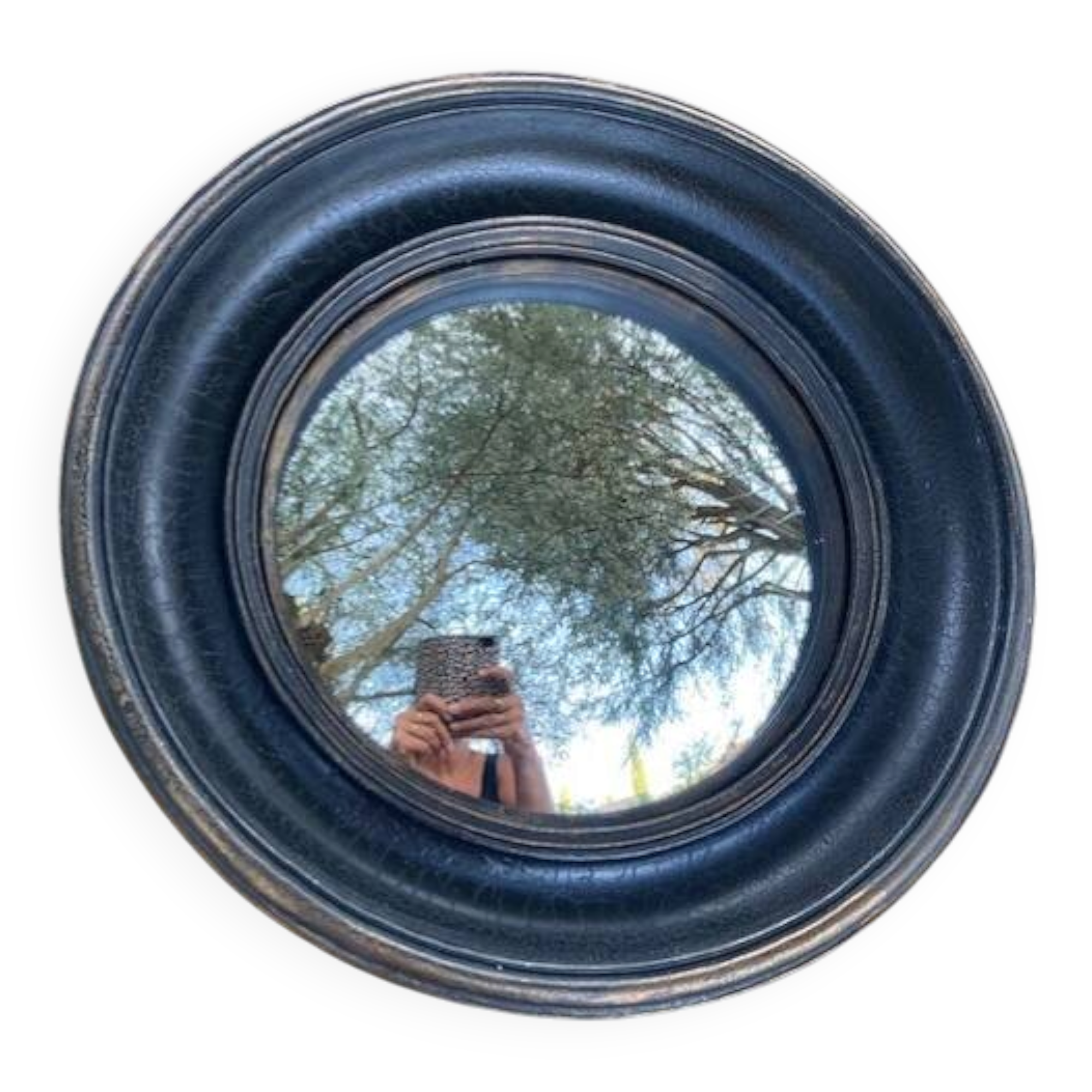 Convex mirror, also known as a witch's mirror.