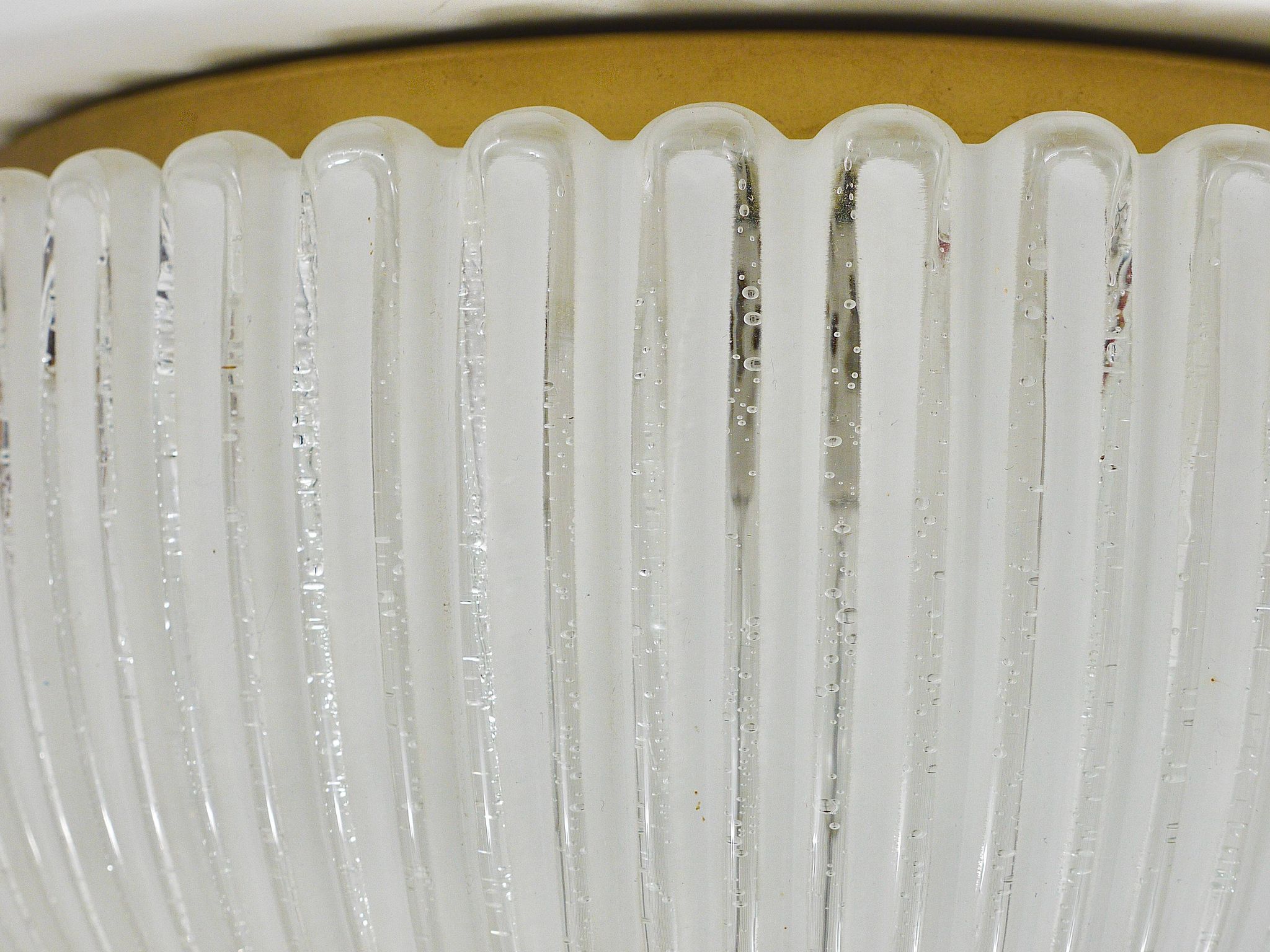 Large striped glass ceiling lamp in brass, Limburg, Germany, 1970s.