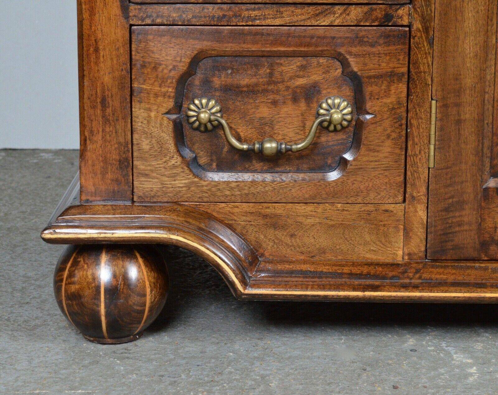 Rustic walnut sideboard with inlaid parquetry, vintage quality.