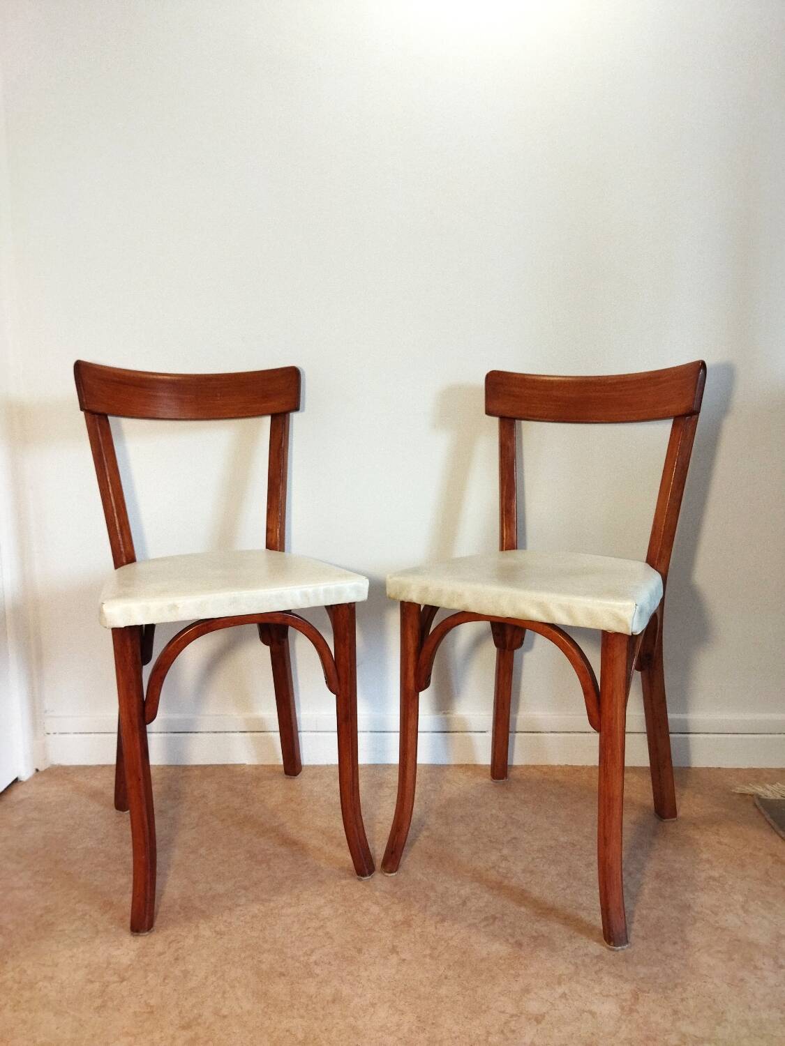 Pair of Baumann bistro chairs