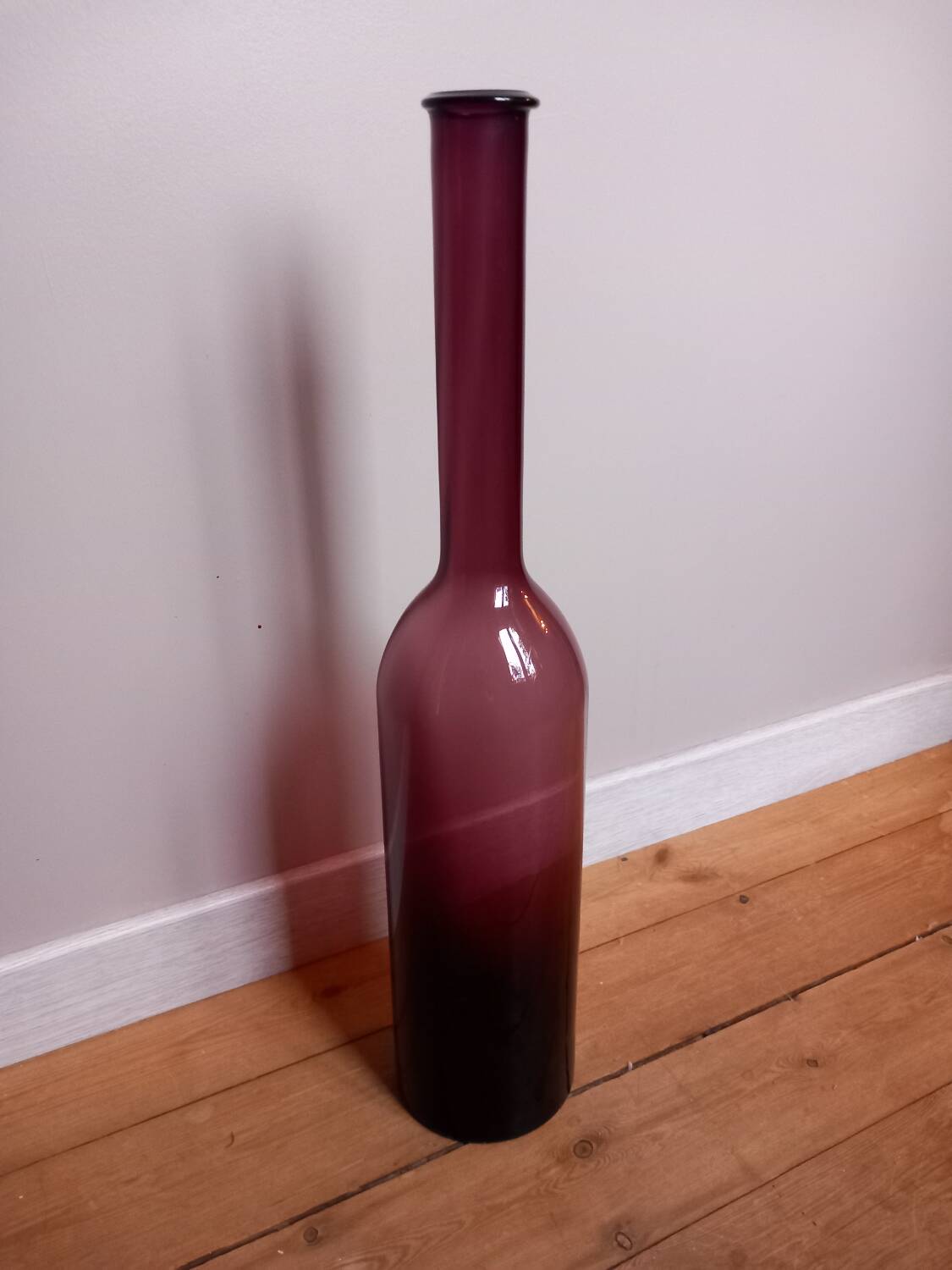 Large glass bottle