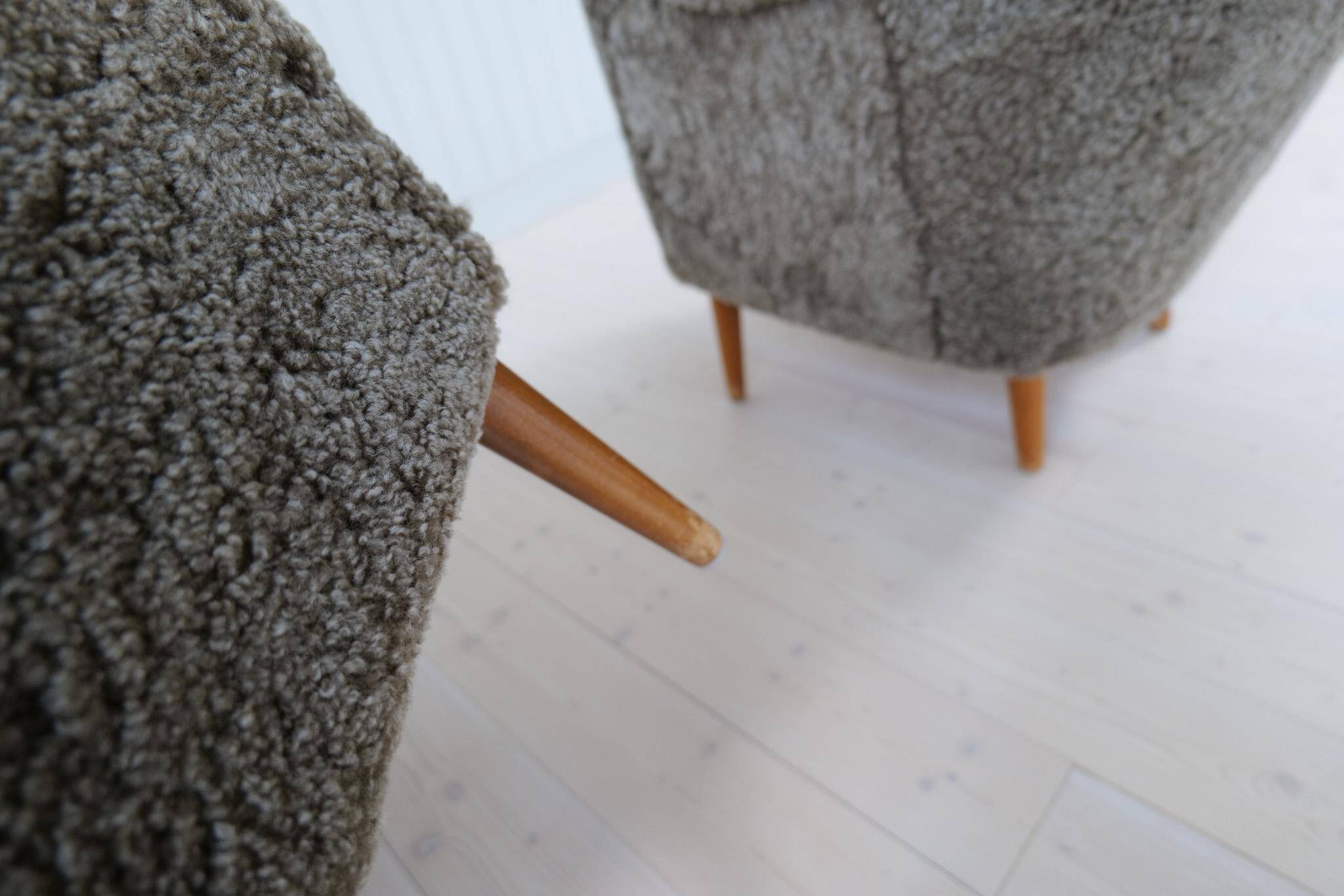 Samspel lounge chairs in sheepskin/mouton modernist mid-century by Carl Malmsten.